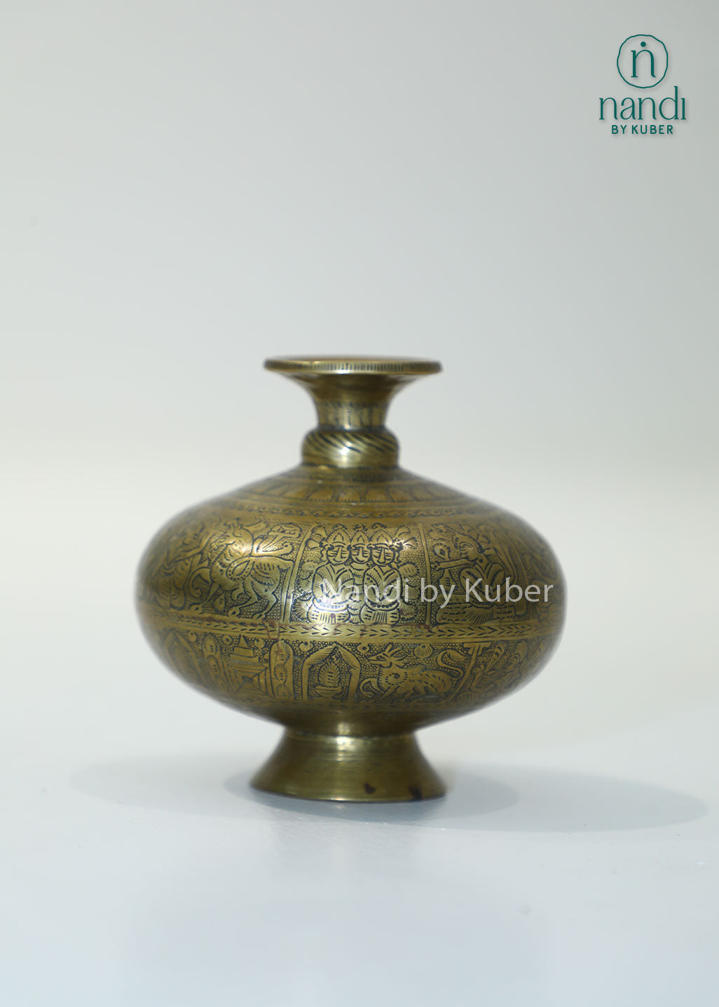 Antique engraved brass surahi vase, traditional Indian decorative metal vase for home décor, tabletop styling, vintage interiors, floral arrangements, heritage décor, and elegant gifting.