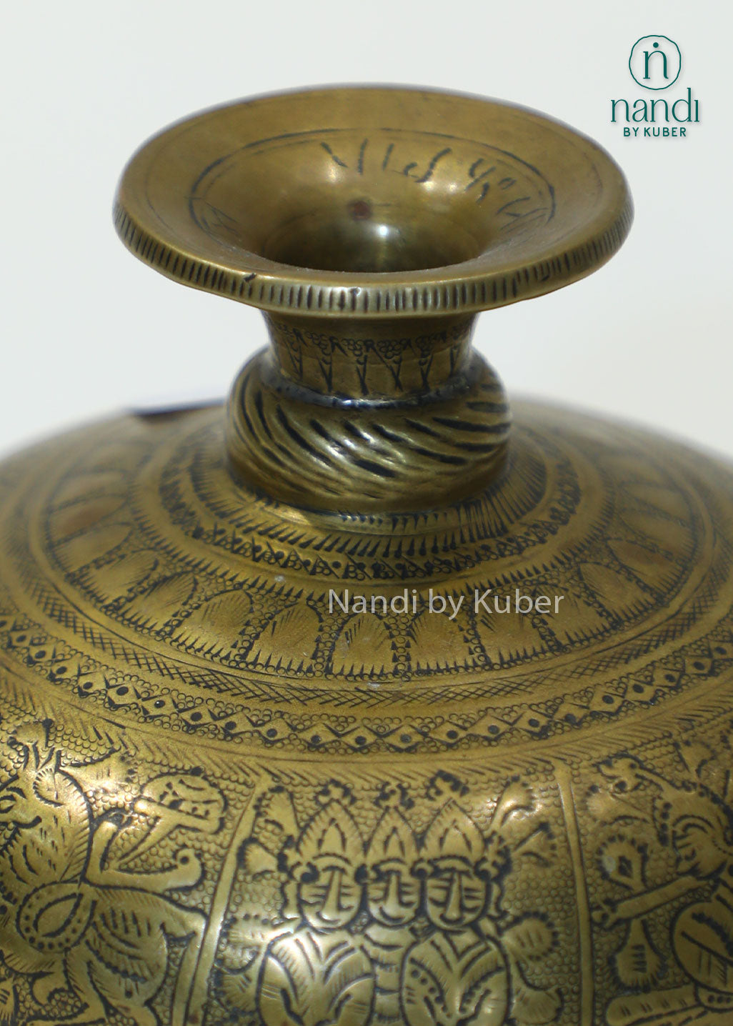 Antique engraved brass surahi vase, traditional Indian decorative metal vase for home décor, tabletop styling, vintage interiors, floral arrangements, heritage décor, and elegant gifting.