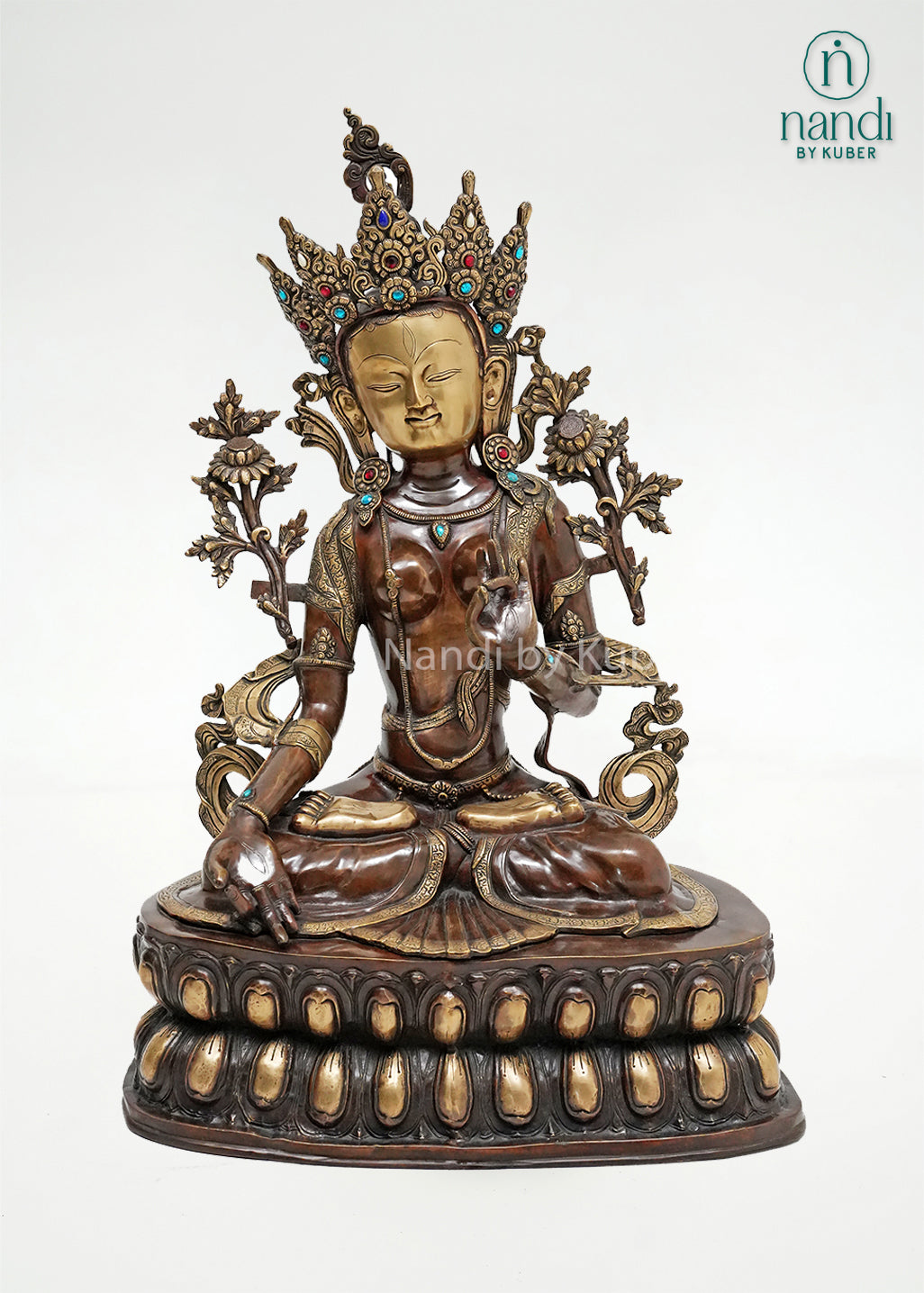 Antique brass Tara sitting statue with ornate crown, lotus pedestal, and intricate handcrafted detailing, ideal for spiritual décor, meditation spaces, and home temple decoration.