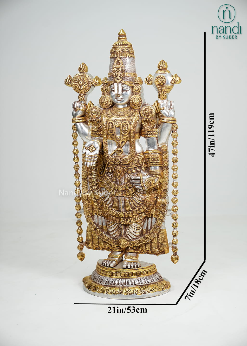 Silver and gold-tone Tirupati Balaji idol with intricate traditional detailing and decorative pedestal base