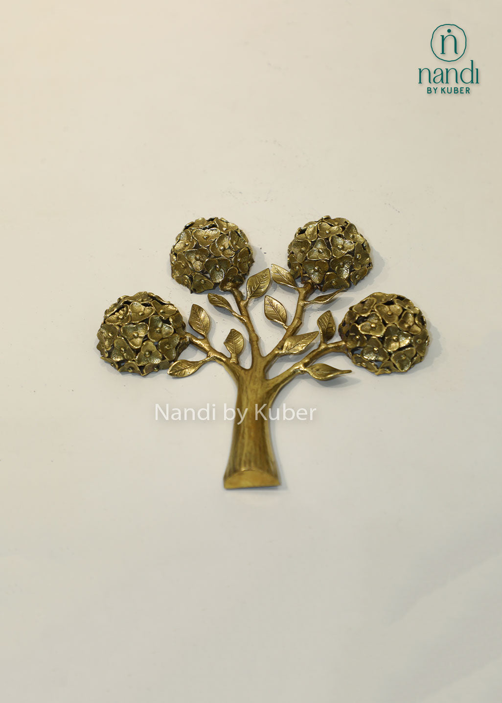 Handcrafted brass tree sculpture with floral motifs, antique gold finish decorative tabletop accent, metal tree of life décor for home, office, living room, and gifting.