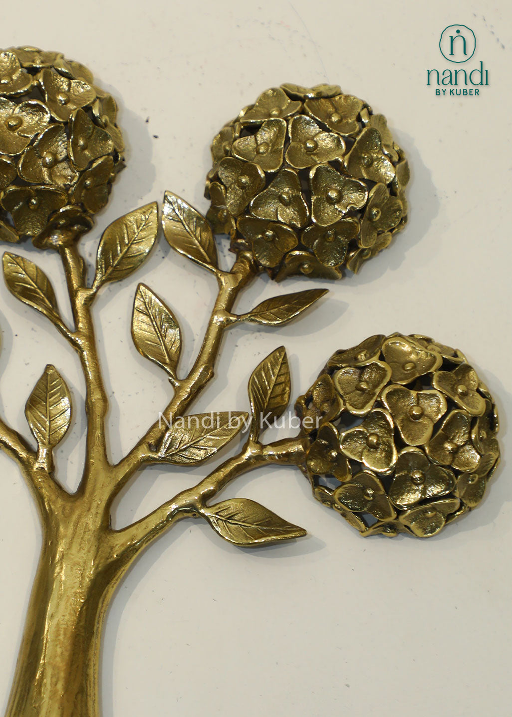 Handcrafted brass tree sculpture with floral motifs, antique gold finish decorative tabletop accent, metal tree of life décor for home, office, living room, and gifting.