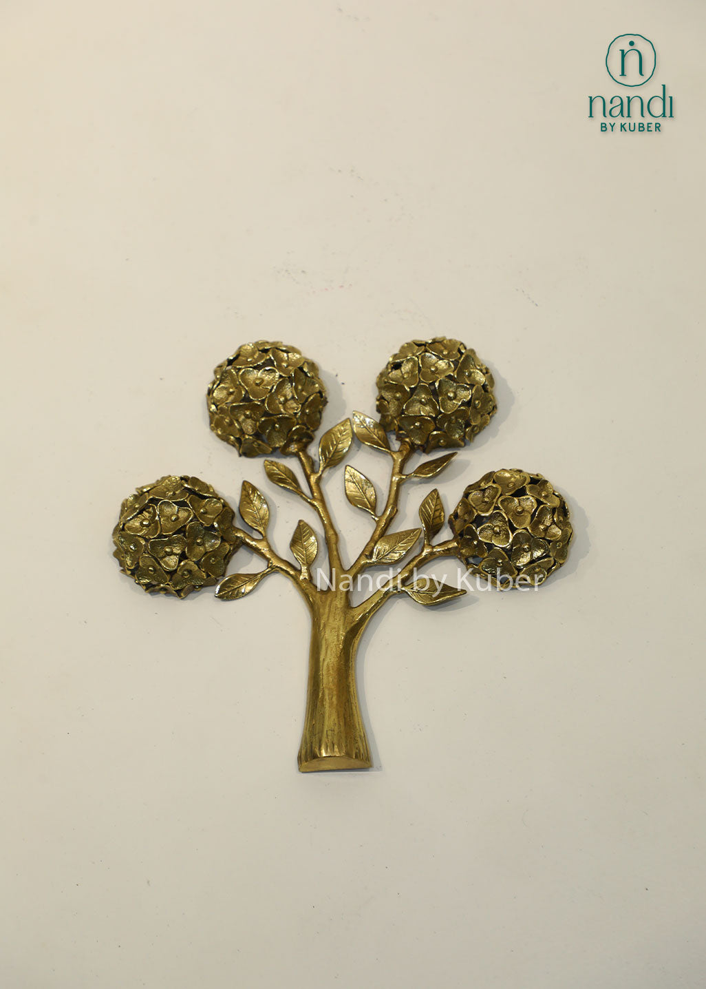 Handcrafted brass tree sculpture with floral motifs, antique gold finish decorative tabletop accent, metal tree of life décor for home, office, living room, and gifting.