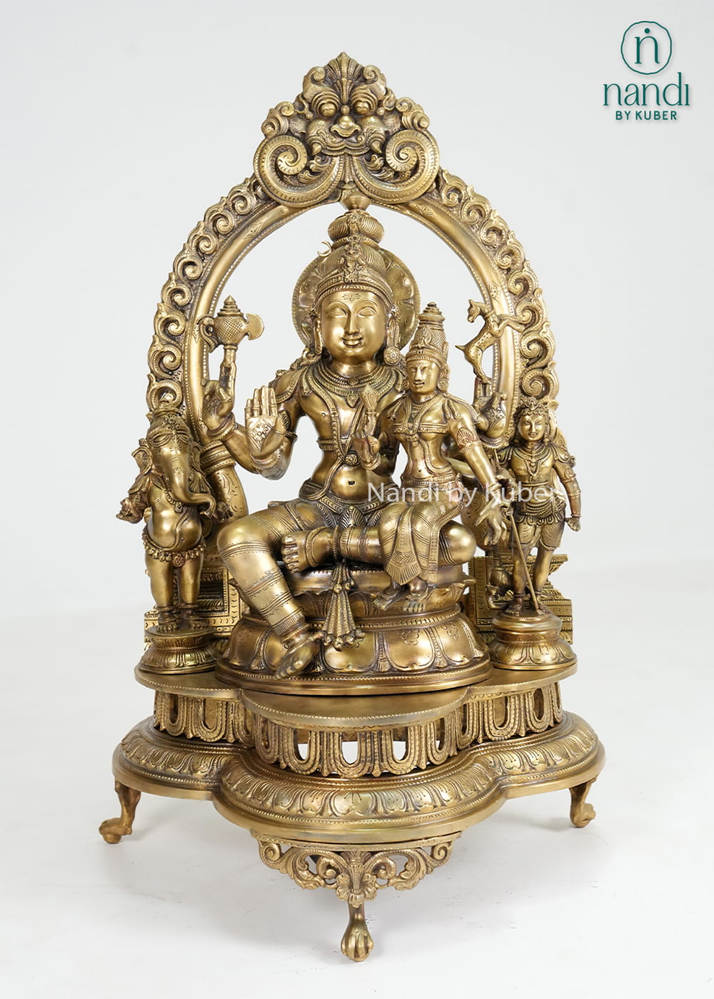 Bronze Shiva Parivar statue with ornate arch and traditional temple-style detailing