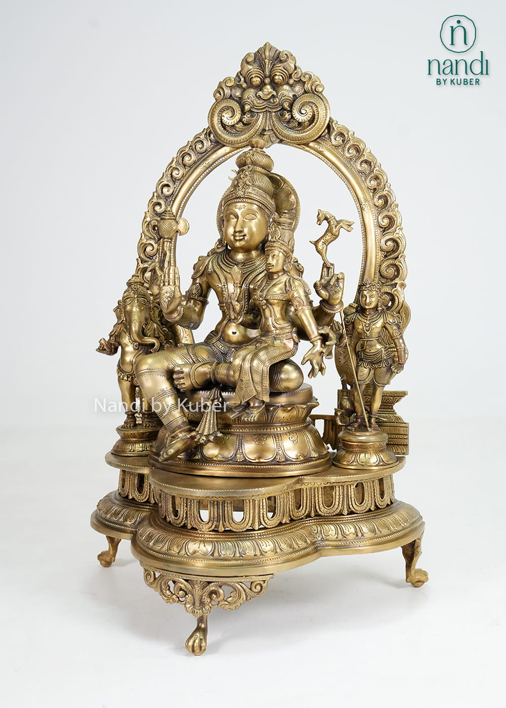 Bronze Shiva Parivar statue with ornate arch and traditional temple-style detailing