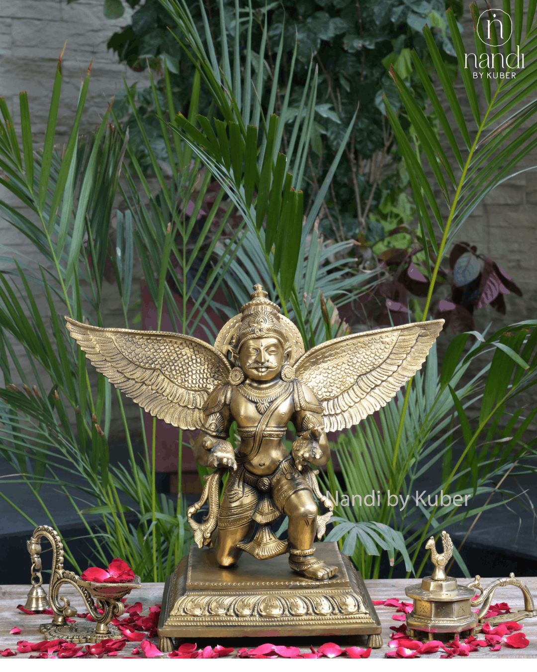 Bronze Garuda statue with spread wings on decorative base