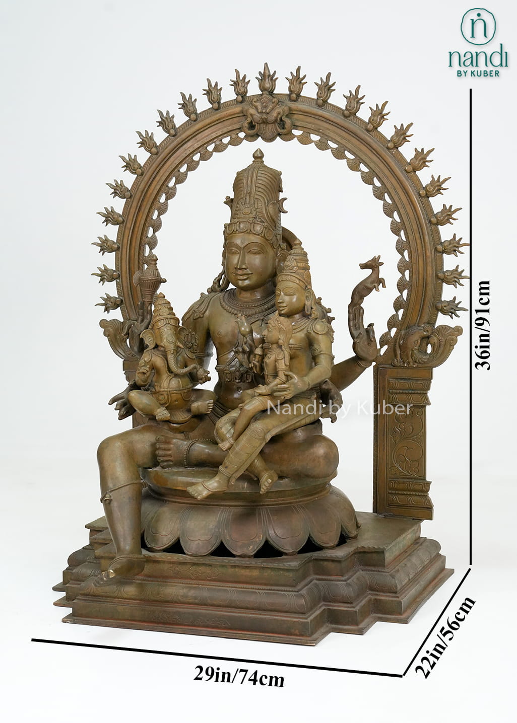 Bronze-finish Shiva Parvati family statue with Lord Ganesha, ornate arch detailing, and an intricately crafted pedestal base.
