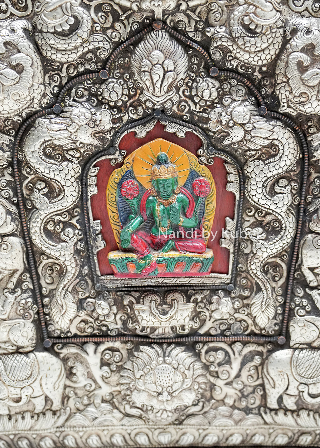 Decorative copper storage box with detailed traditional carvings, Buddha artwork accent, and antique finish, ideal for spiritual décor, collectible displays, and heritage-inspired interiors.