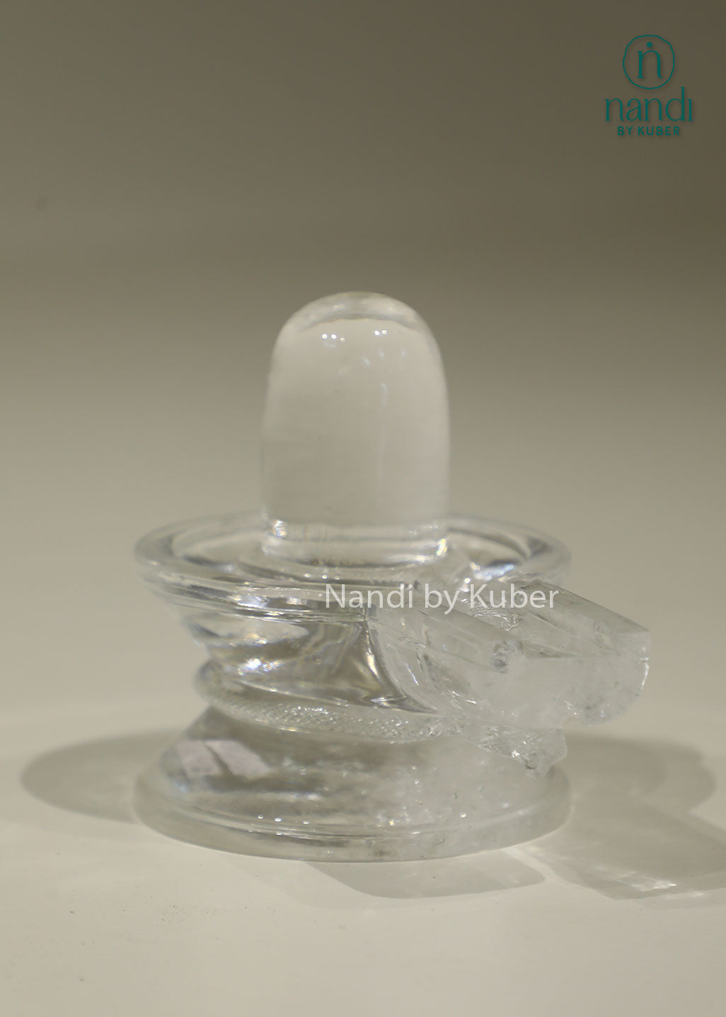 Natural Clear Crystal Shivling statue, transparent crystal Shiva Lingam for home temple, puja room, meditation, Vastu, spiritual healing, positive energy, devotional worship, and sacred Hindu décor.
