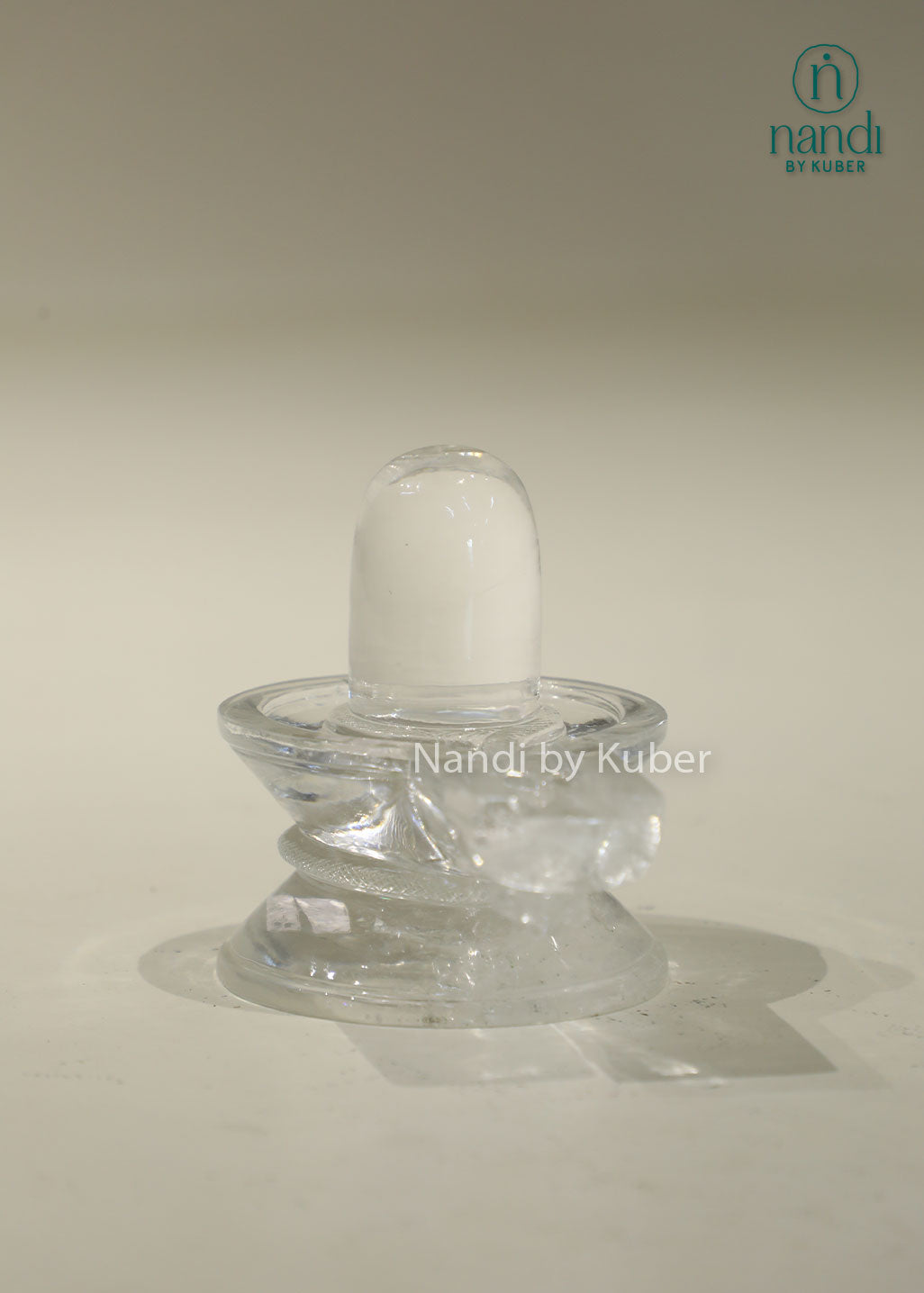 Natural Clear Crystal Shivling statue, transparent crystal Shiva Lingam for home temple, puja room, meditation, Vastu, spiritual healing, positive energy, devotional worship, and sacred Hindu décor.