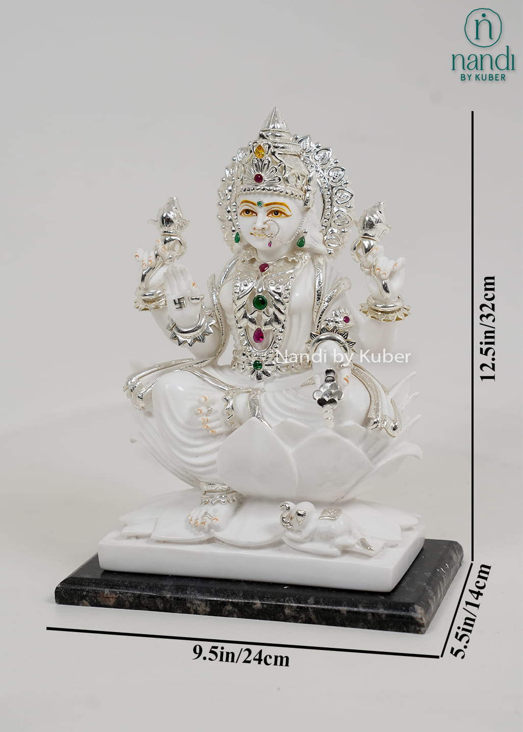White marble Lakshmi statue seated on a lotus