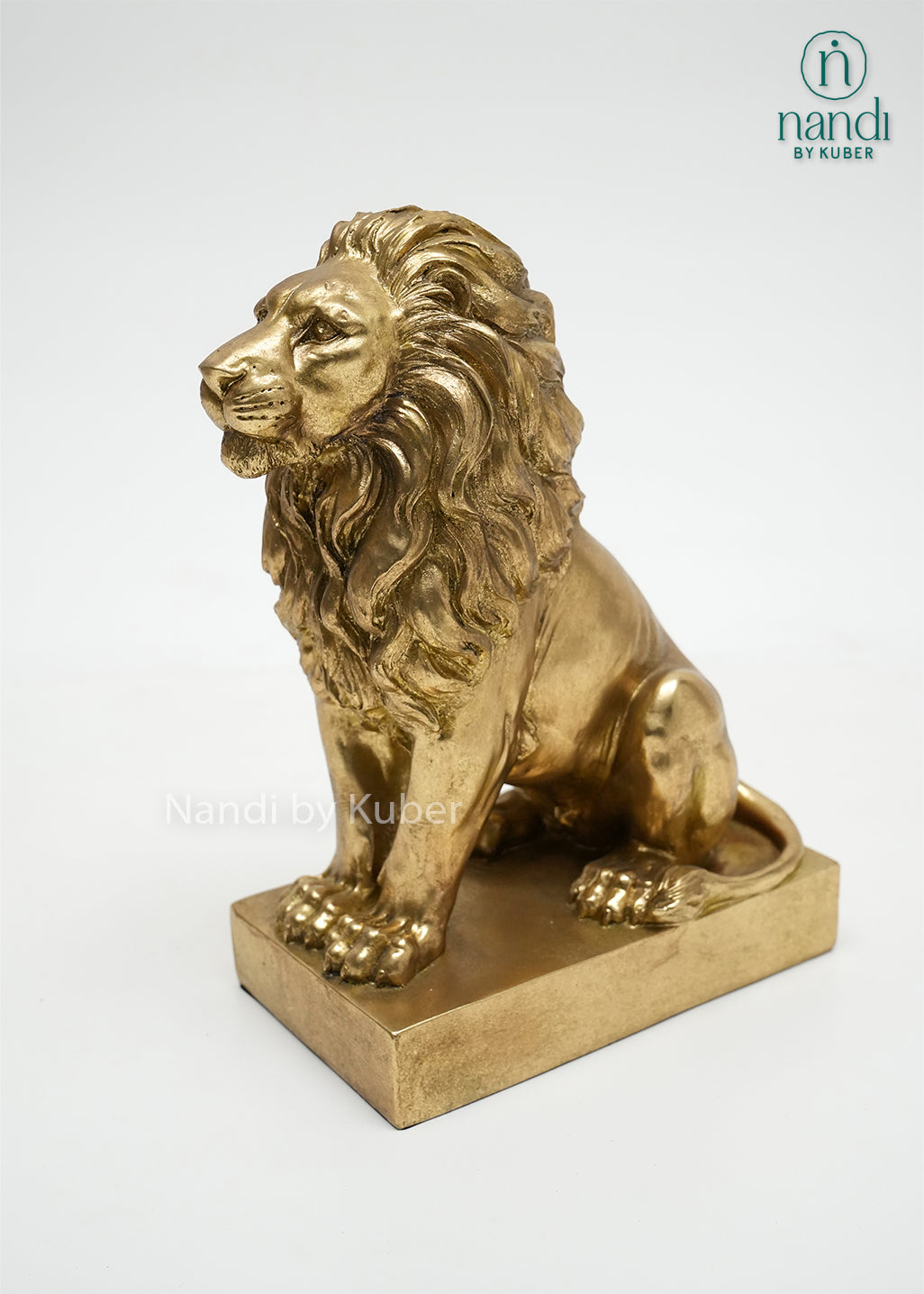 Decorative golden lion figurine with intricate detailing, symbolizing strength, leadership, courage, and regal elegance.