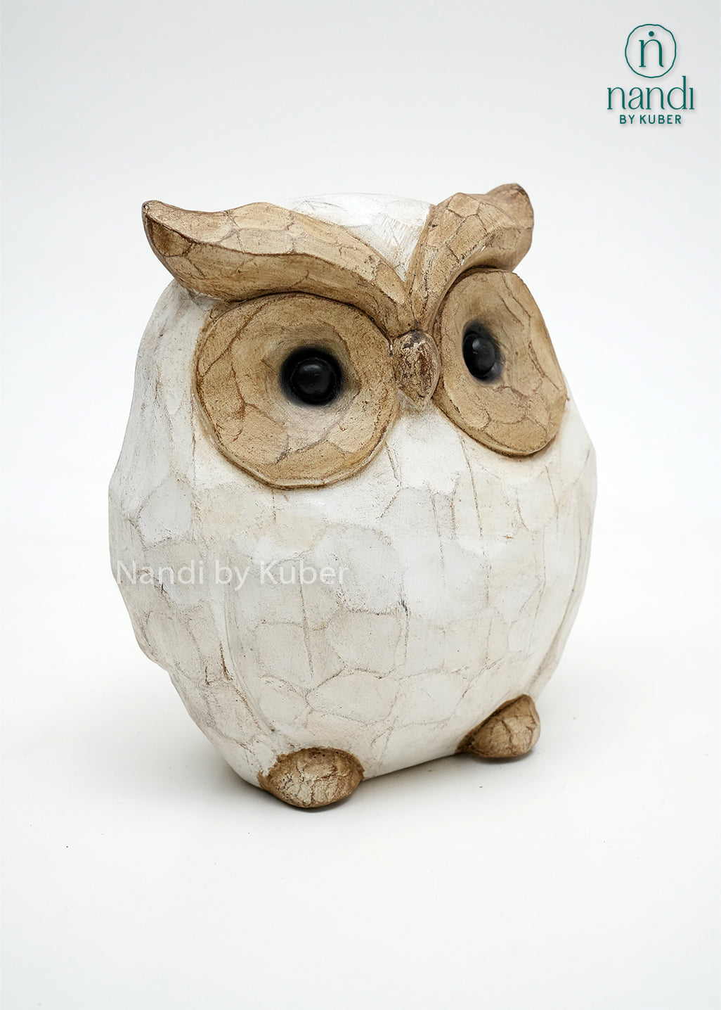 Decorative owl figurine with a white and natural wood finish, symbolizing wisdom, intuition, and timeless decorative appeal.