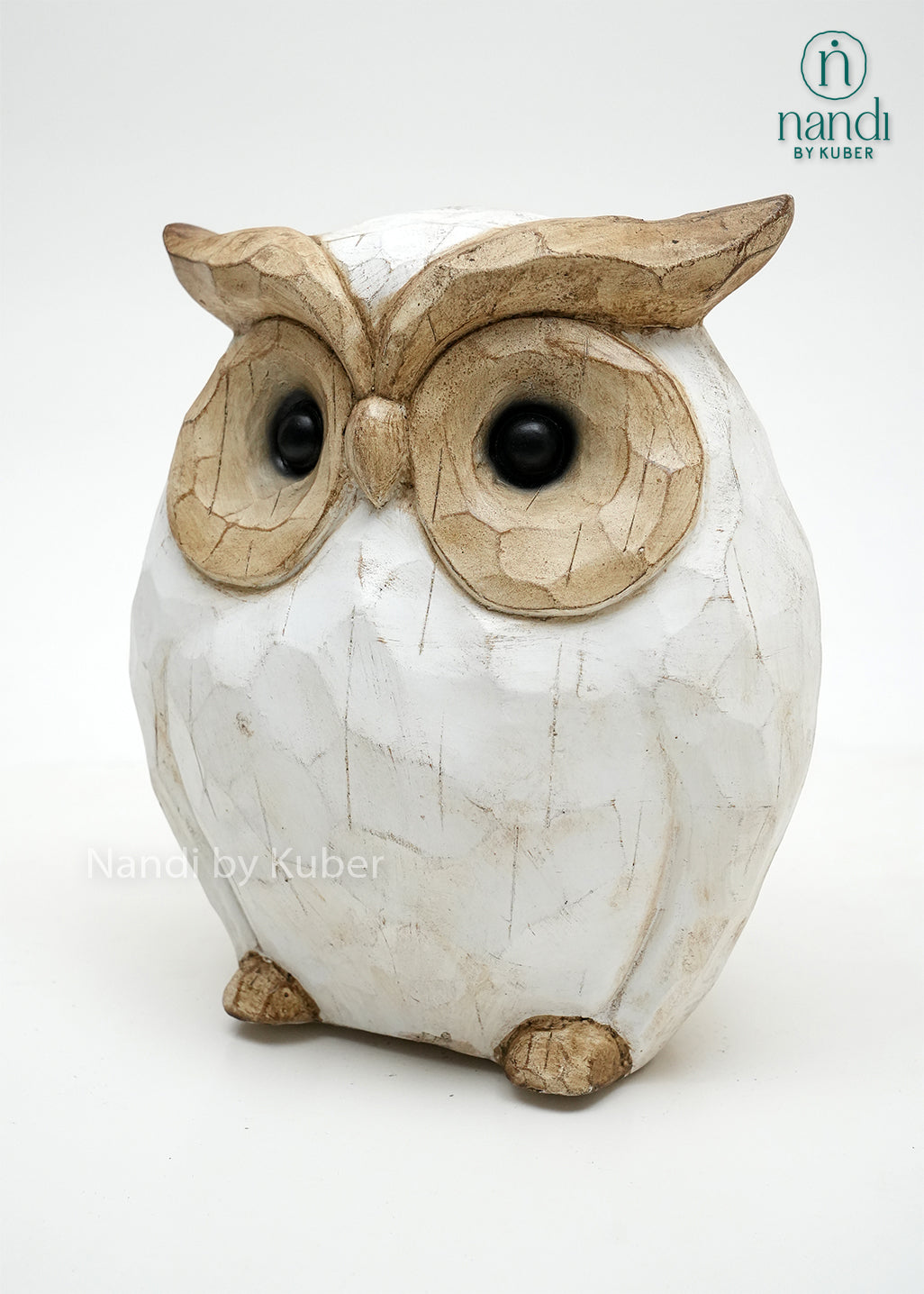 Decorative owl figurine with a white and natural wood finish, symbolizing wisdom, intuition, and timeless decorative appeal.