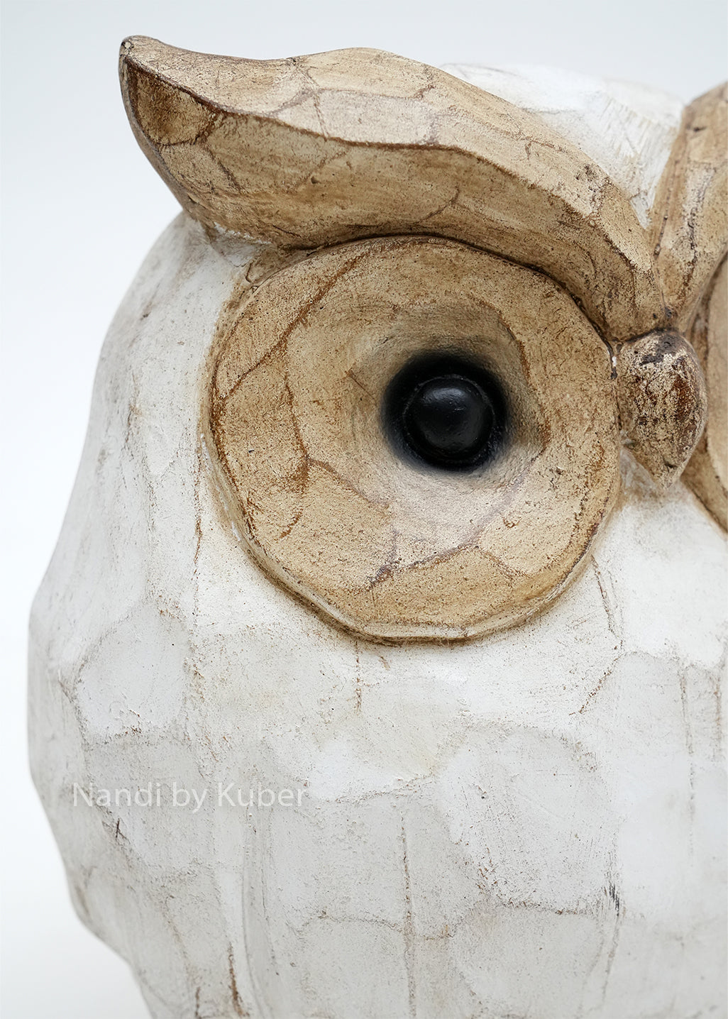 Decorative owl figurine with a white and natural wood finish, symbolizing wisdom, intuition, and timeless decorative appeal.