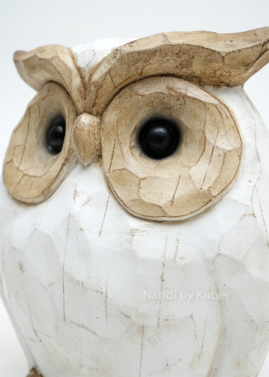Decorative owl figurine with a white and natural wood finish, symbolizing wisdom, intuition, and timeless decorative appeal.