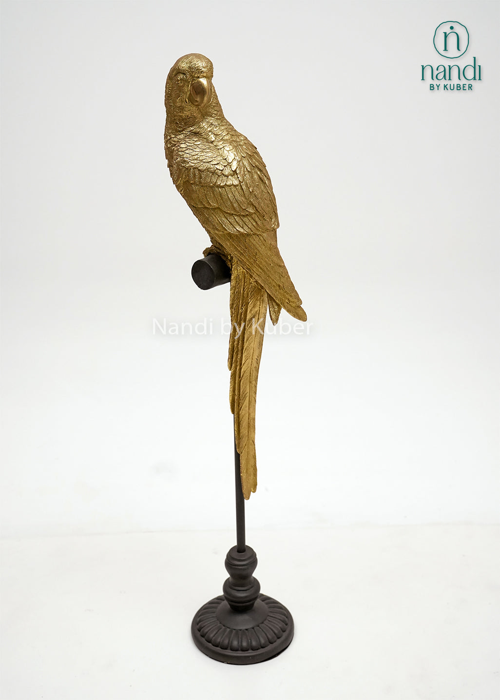 Decorative parrot figurine on a stand with detailed craftsmanship and an antique gold finish, bringing elegance and vibrant charm to any space.