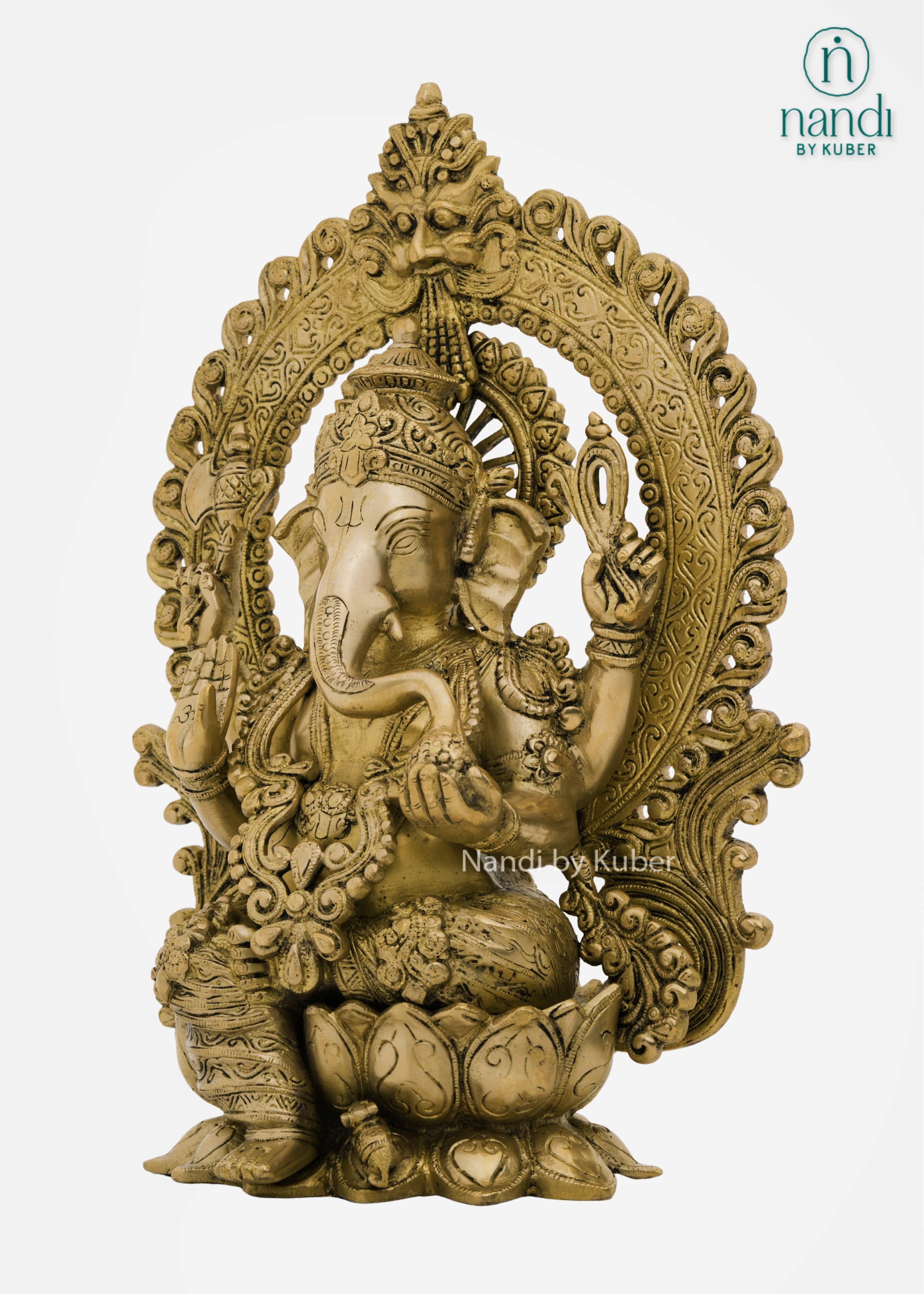 Brass Ganesha idol with decorative arch