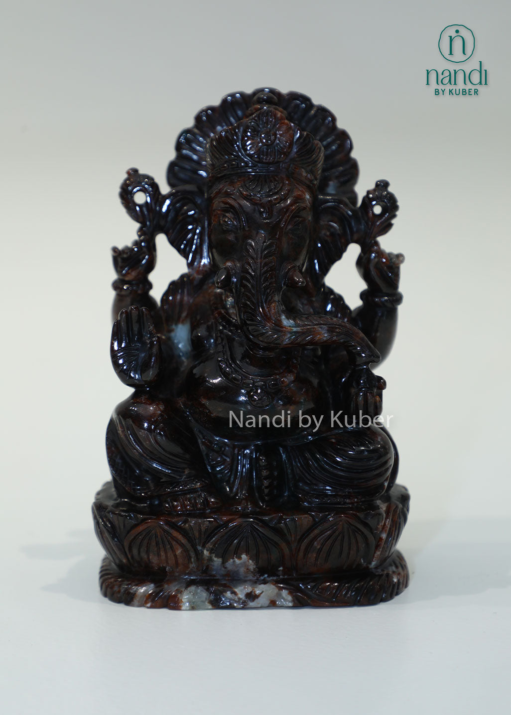 Natural Gomed stone Ganesha statue, Hessonite Garnet Lord Ganesh idol for Vastu, wealth, prosperity, spiritual healing, home temple décor, office desk decoration, meditation space, and auspicious gifting.