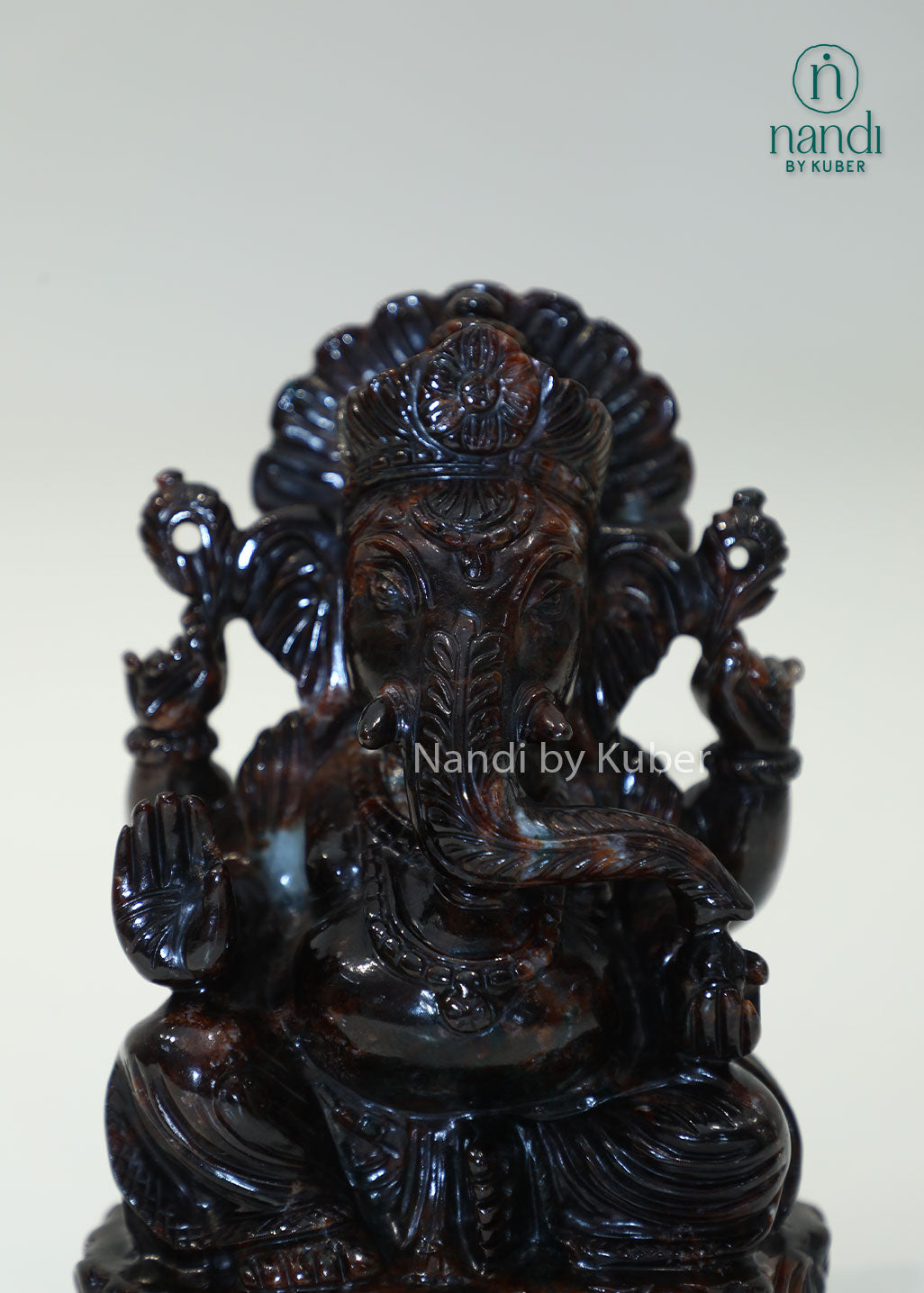 Natural Gomed stone Ganesha statue, Hessonite Garnet Lord Ganesh idol for Vastu, wealth, prosperity, spiritual healing, home temple décor, office desk decoration, meditation space, and auspicious gifting.