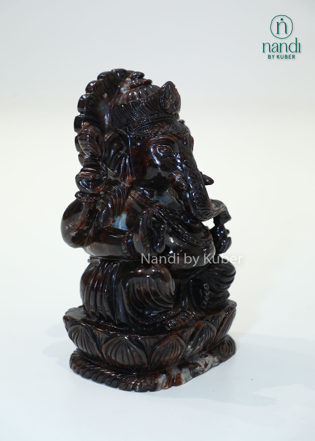 Natural Gomed stone Ganesha statue, Hessonite Garnet Lord Ganesh idol for Vastu, wealth, prosperity, spiritual healing, home temple décor, office desk decoration, meditation space, and auspicious gifting.