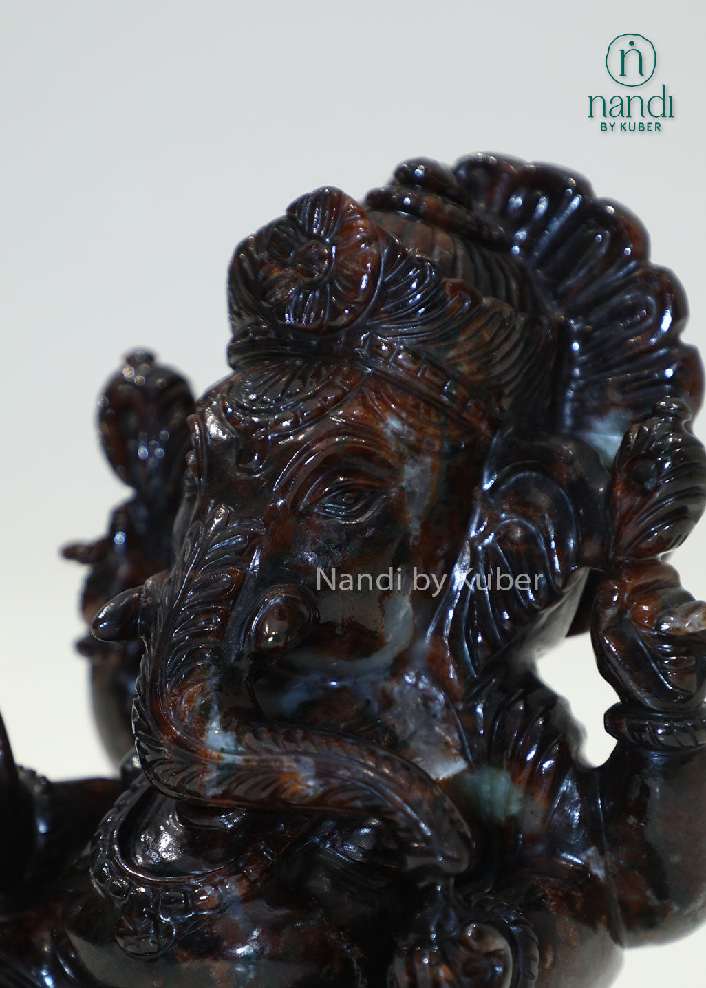 Natural Gomed stone Ganesha statue, Hessonite Garnet Lord Ganesh idol for Vastu, wealth, prosperity, spiritual healing, home temple décor, office desk decoration, meditation space, and auspicious gifting.