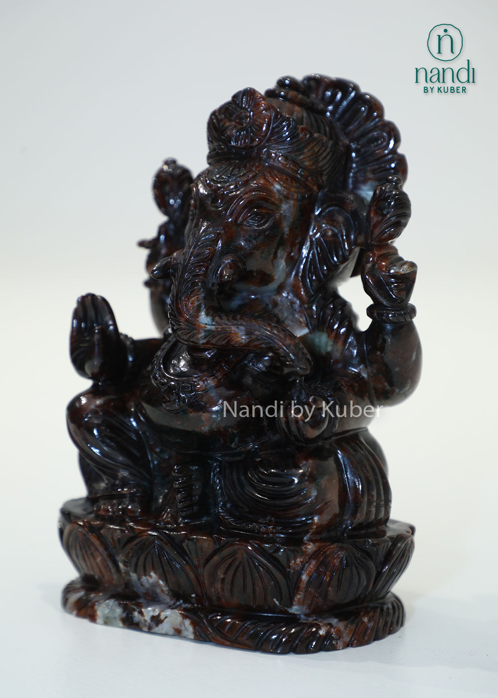 Natural Gomed stone Ganesha statue, Hessonite Garnet Lord Ganesh idol for Vastu, wealth, prosperity, spiritual healing, home temple décor, office desk decoration, meditation space, and auspicious gifting.