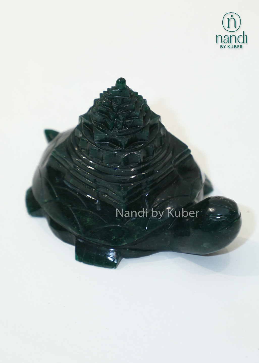Green jade stone tortoise with Shri Yantra carving, Vastu and Feng Shui prosperity symbol for wealth, positive energy, home décor, office desk decoration, and spiritual gifting.