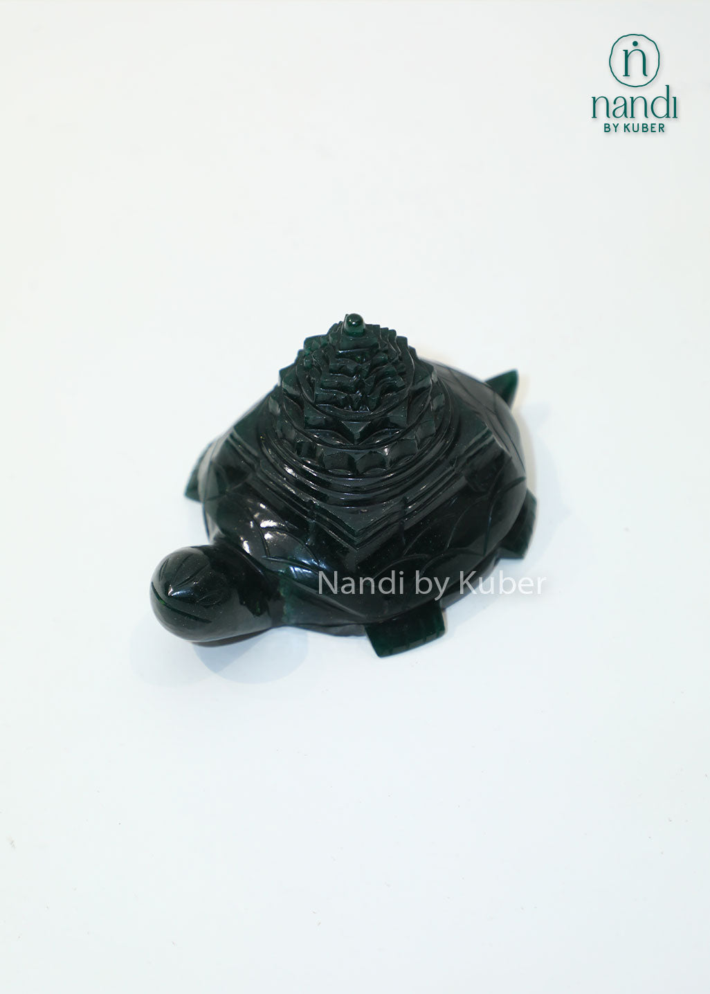Green jade stone tortoise with Shri Yantra carving, Vastu and Feng Shui prosperity symbol for wealth, positive energy, home décor, office desk decoration, and spiritual gifting.