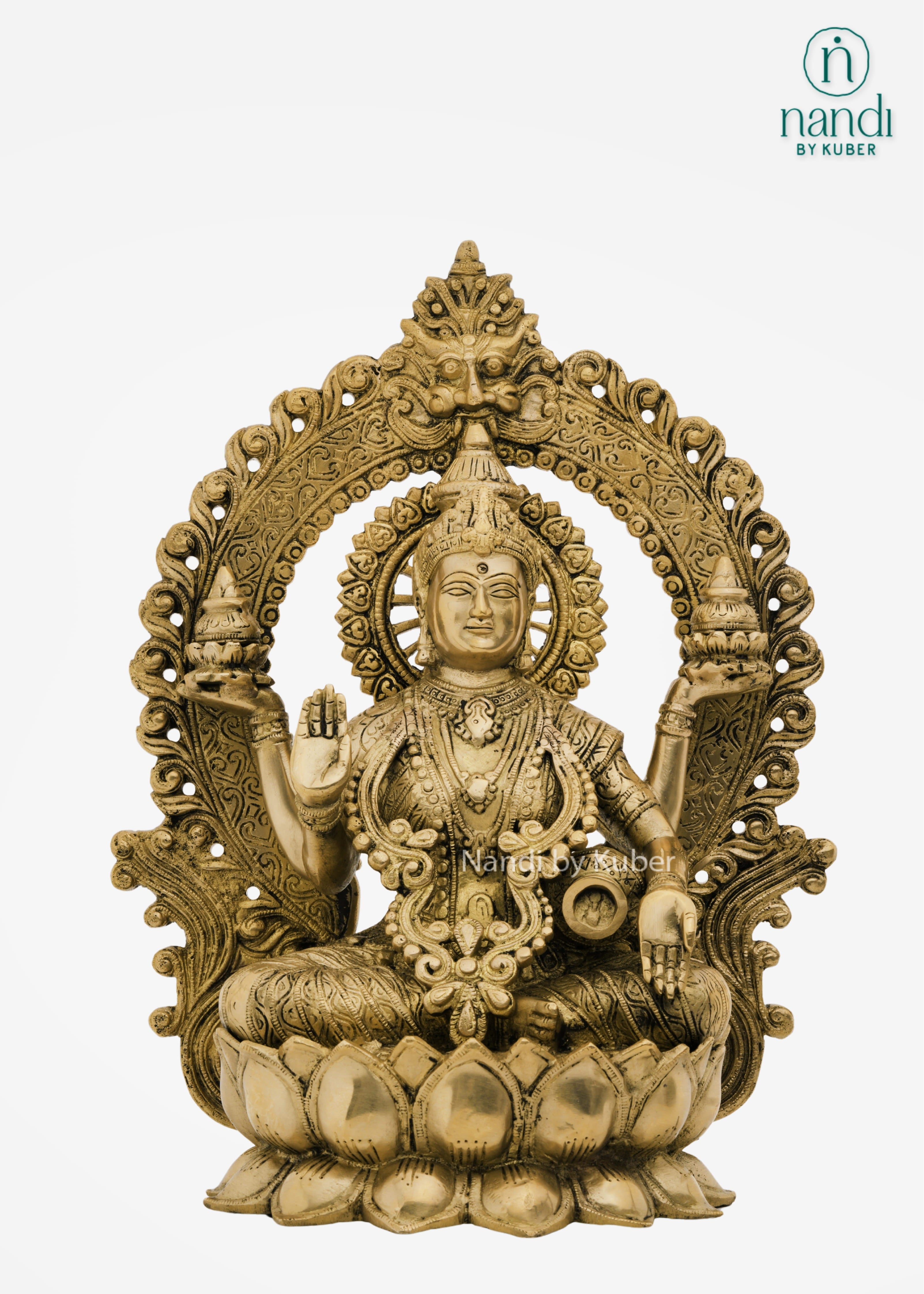 Brass Lakshmi idol with lotus arch
