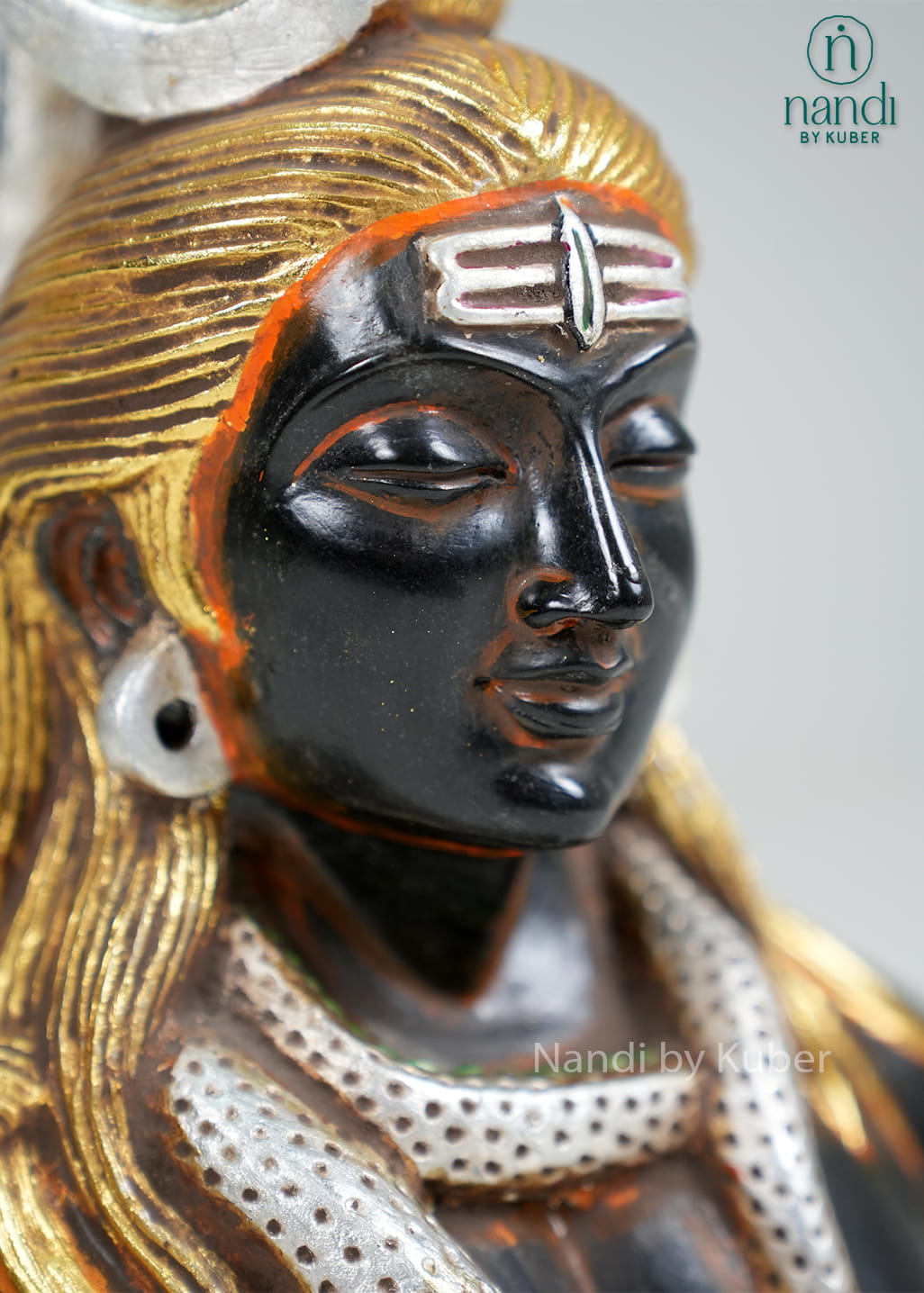 Black marble Lord Shiva bust with gold detailing