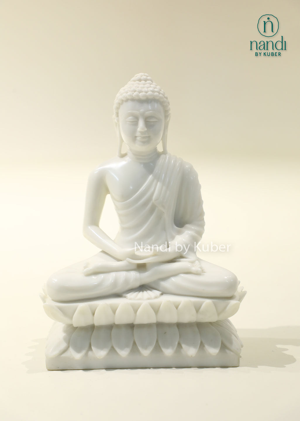 White marble Buddha meditation statue on lotus base for home décor, meditation room, yoga studio, spiritual healing, mindfulness practice, Zen décor, positive energy, Vastu, and peaceful interior styling.