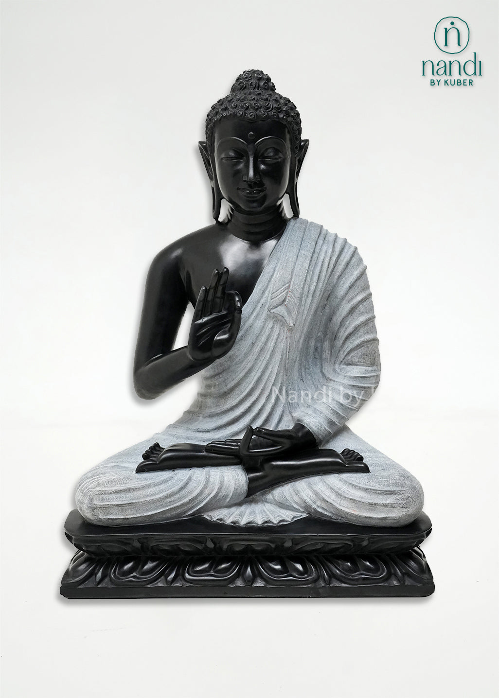 Handcrafted black and white Buddha meditation statue with lotus base, spiritual marble-look sculpture for home décor, meditation spaces, living rooms, and gifting.