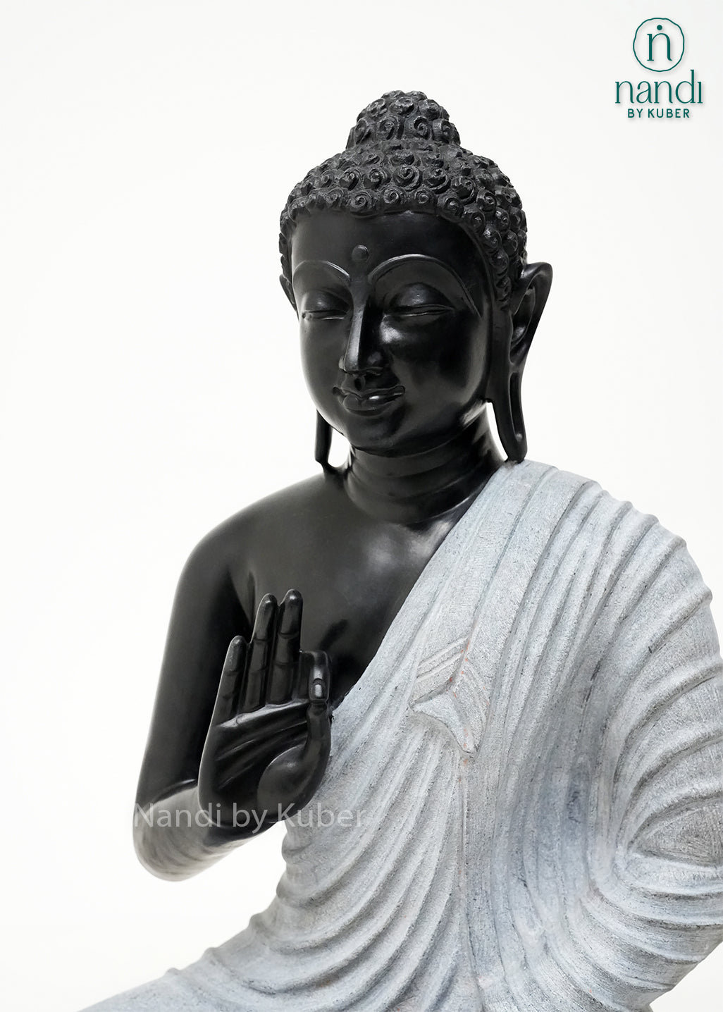 Handcrafted black and white Buddha meditation statue with lotus base, spiritual marble-look sculpture for home décor, meditation spaces, living rooms, and gifting.