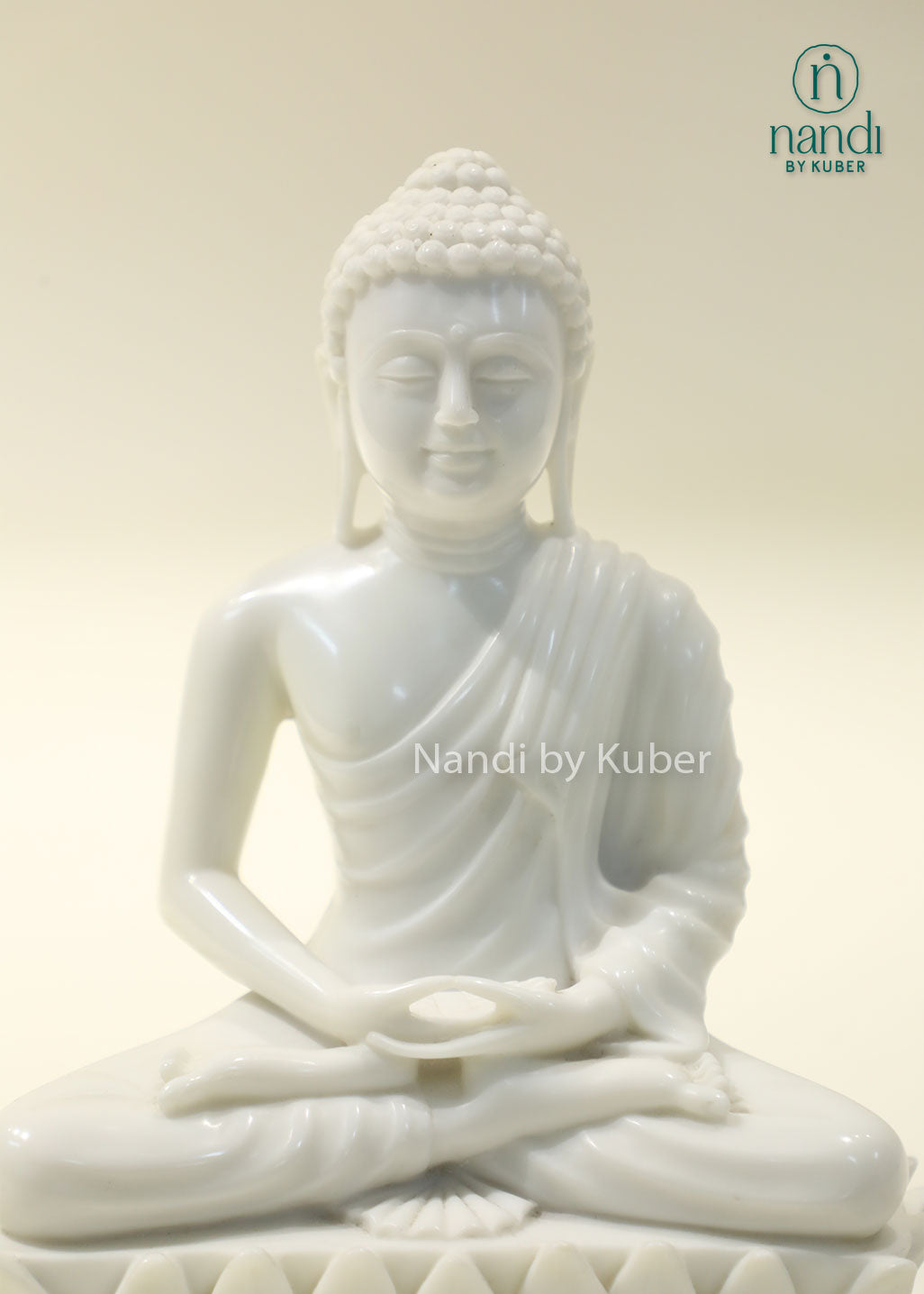 White marble Buddha meditation statue on lotus base for home décor, meditation room, yoga studio, spiritual healing, mindfulness practice, Zen décor, positive energy, Vastu, and peaceful interior styling.