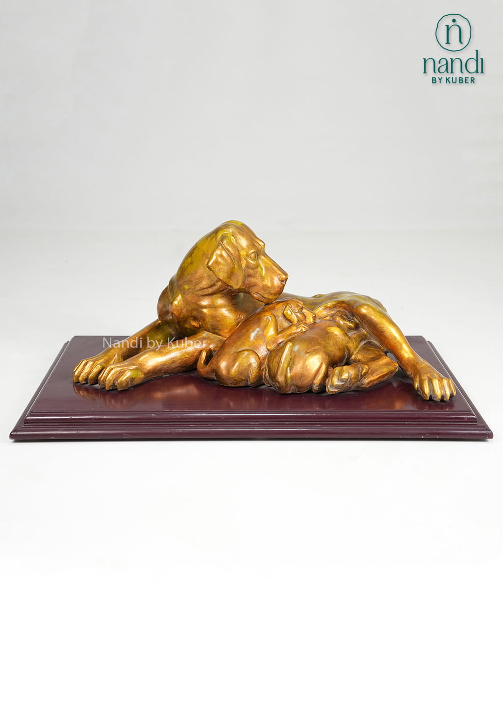 Marble dog and puppy sculpture on wooden display base