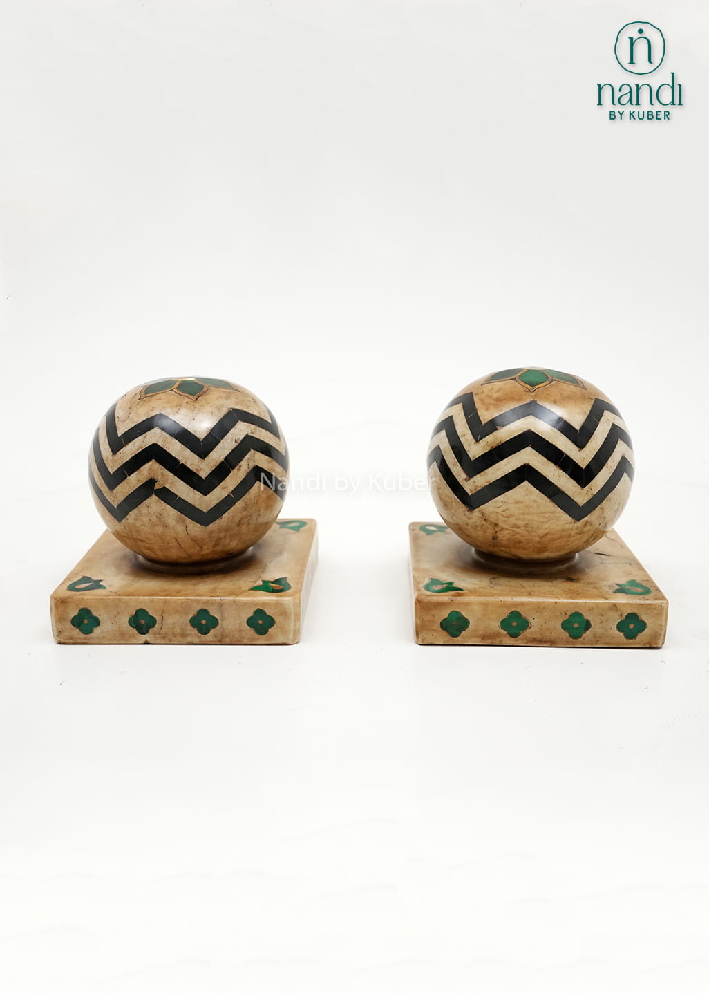 Handcrafted marble door stopper pair with decorative geometric patterns, offering both practical functionality and elegant home décor appeal.