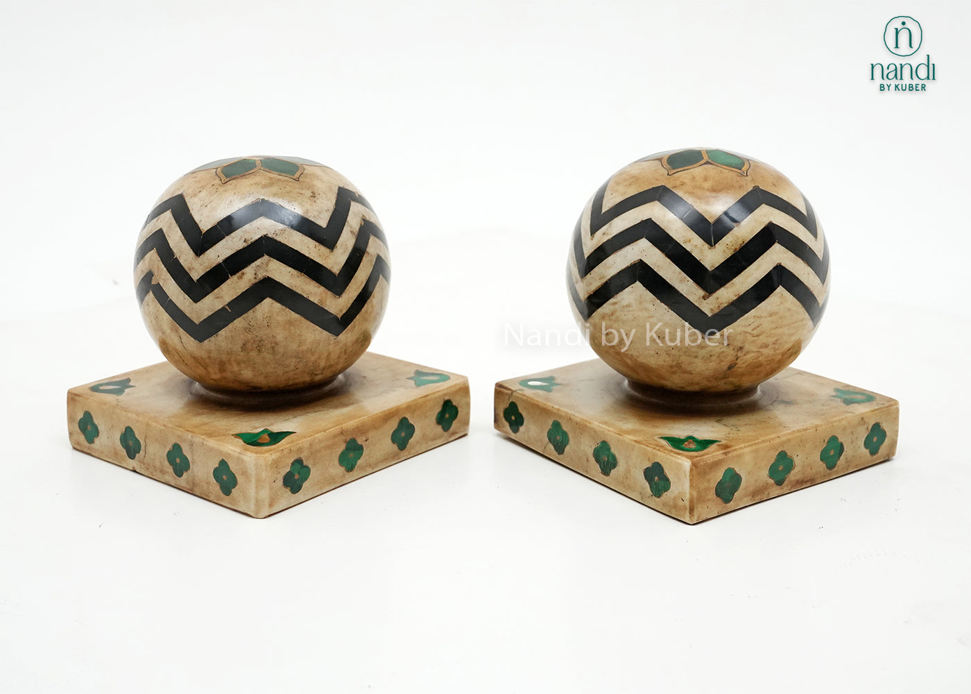 Handcrafted marble door stopper pair with decorative geometric patterns, offering both practical functionality and elegant home décor appeal.