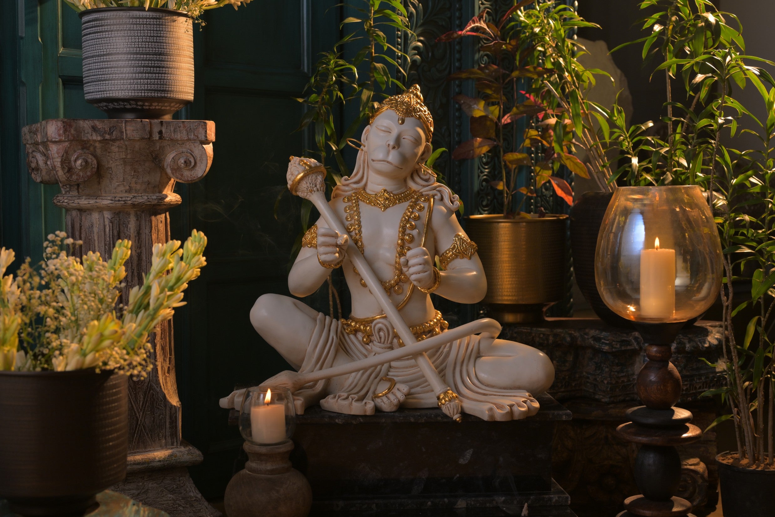 Handcrafted marble dust Hanuman idol in dhyan mudra with gold embellishments and ceremonial mace, ideal for meditation spaces, home temples, spiritual décor, and devotional gifting.