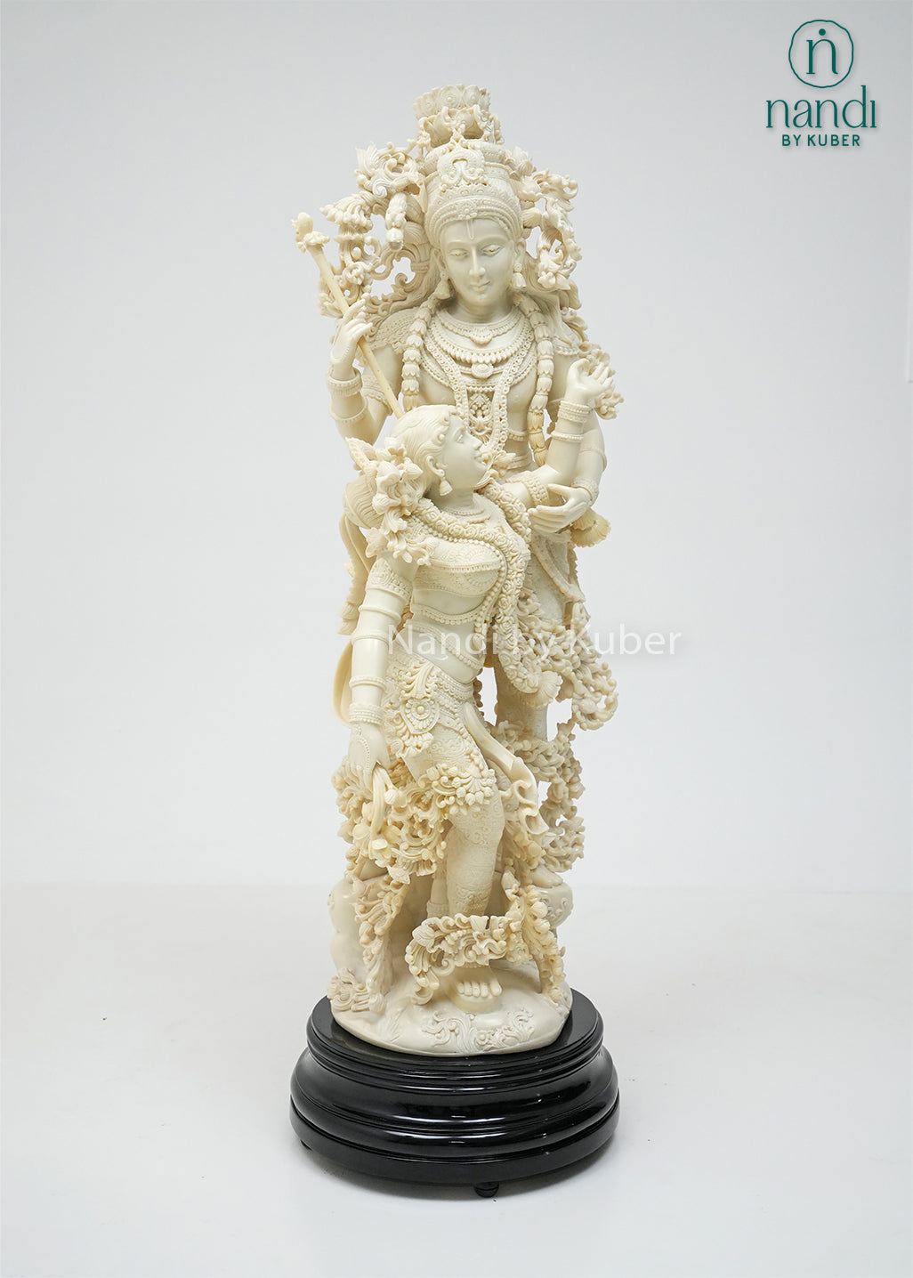 Elegant Radha Krishna sculpture with decorative base, symbolizing divine love, harmony, and devotion while enhancing any sacred or decorative space.