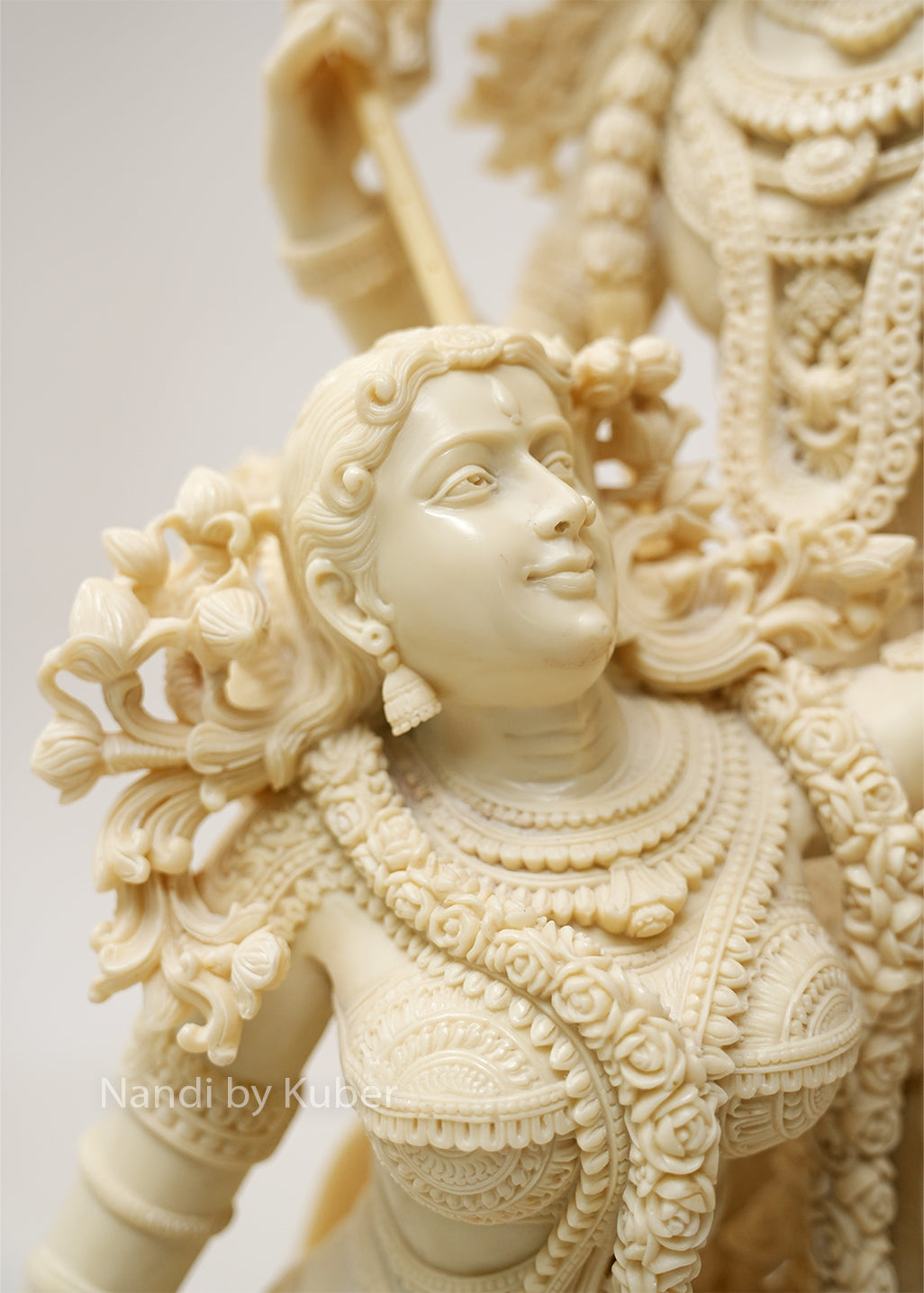 Elegant Radha Krishna sculpture with decorative base, symbolizing divine love, harmony, and devotion while enhancing any sacred or decorative space.