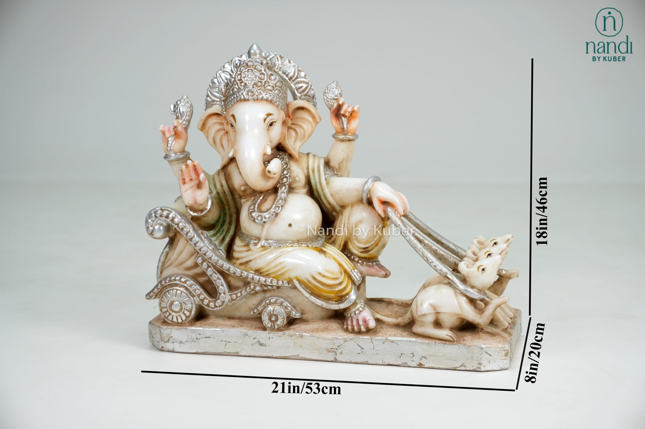 Marble-style Lord Ganesha statue seated on an ornate chariot with sacred mouse companion, intricate detailing, and antique-finish accents.