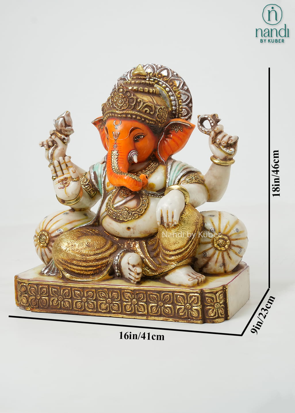 White marble-style Lord Ganesha statue with orange accents, antique gold detailing, ornate crown, and decorative pedestal base.