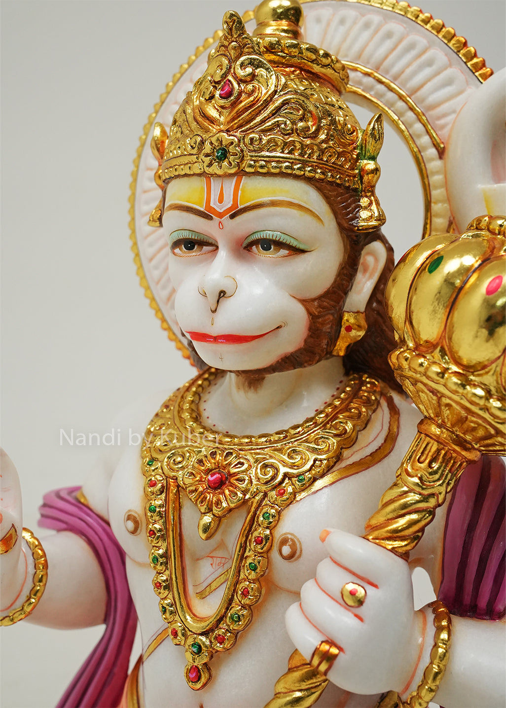 Marble Hanuman idol with gold detailing and blessing gesture, decorative Hindu deity statue with gada for home temple, pooja room décor, spiritual gifting, and religious display.