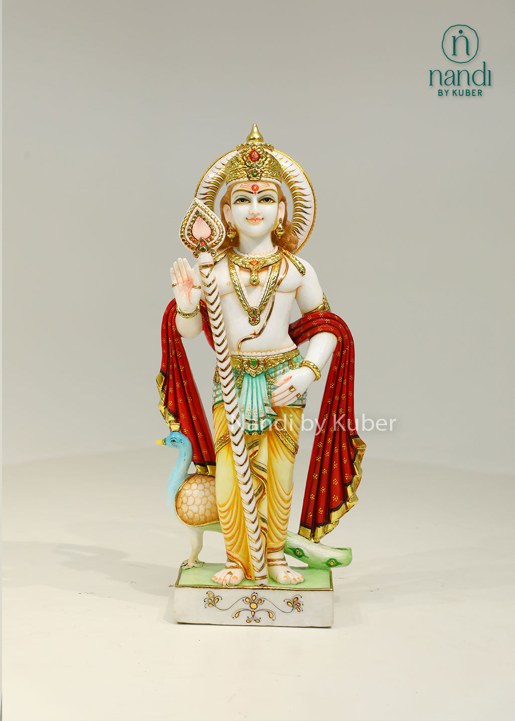 Handcrafted marble statue of Lord Kartikeya (Murugan Swami) with his sacred peacock, beautifully detailed and ideal for devotional and spiritual décor.