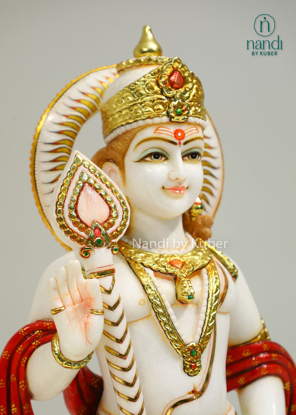 Handcrafted marble statue of Lord Kartikeya (Murugan Swami) with his sacred peacock, beautifully detailed and ideal for devotional and spiritual décor.