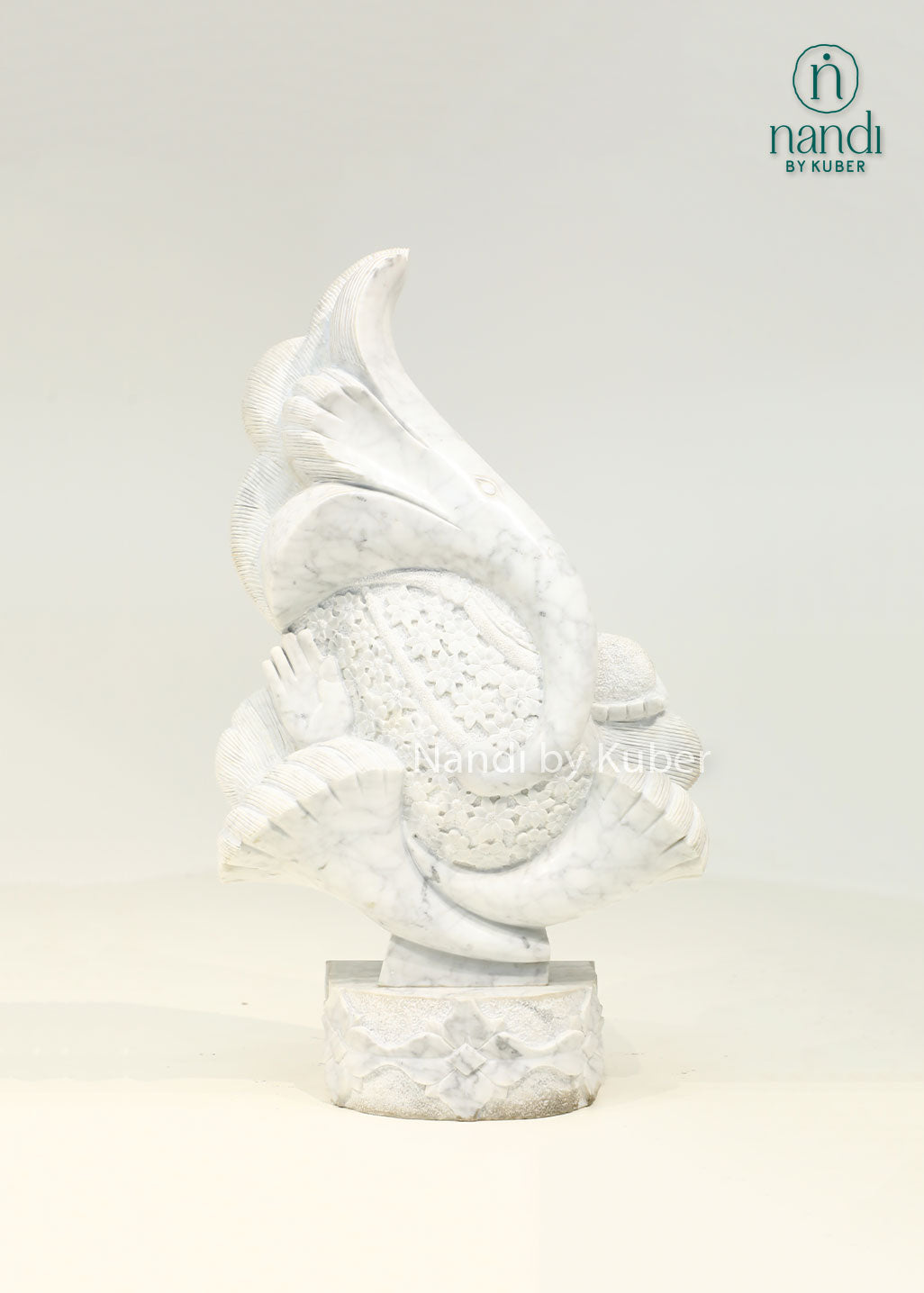 Modern marble Ganesha sculpture with an artistic abstract design, symbolizing wisdom, prosperity, and timeless elegance.
