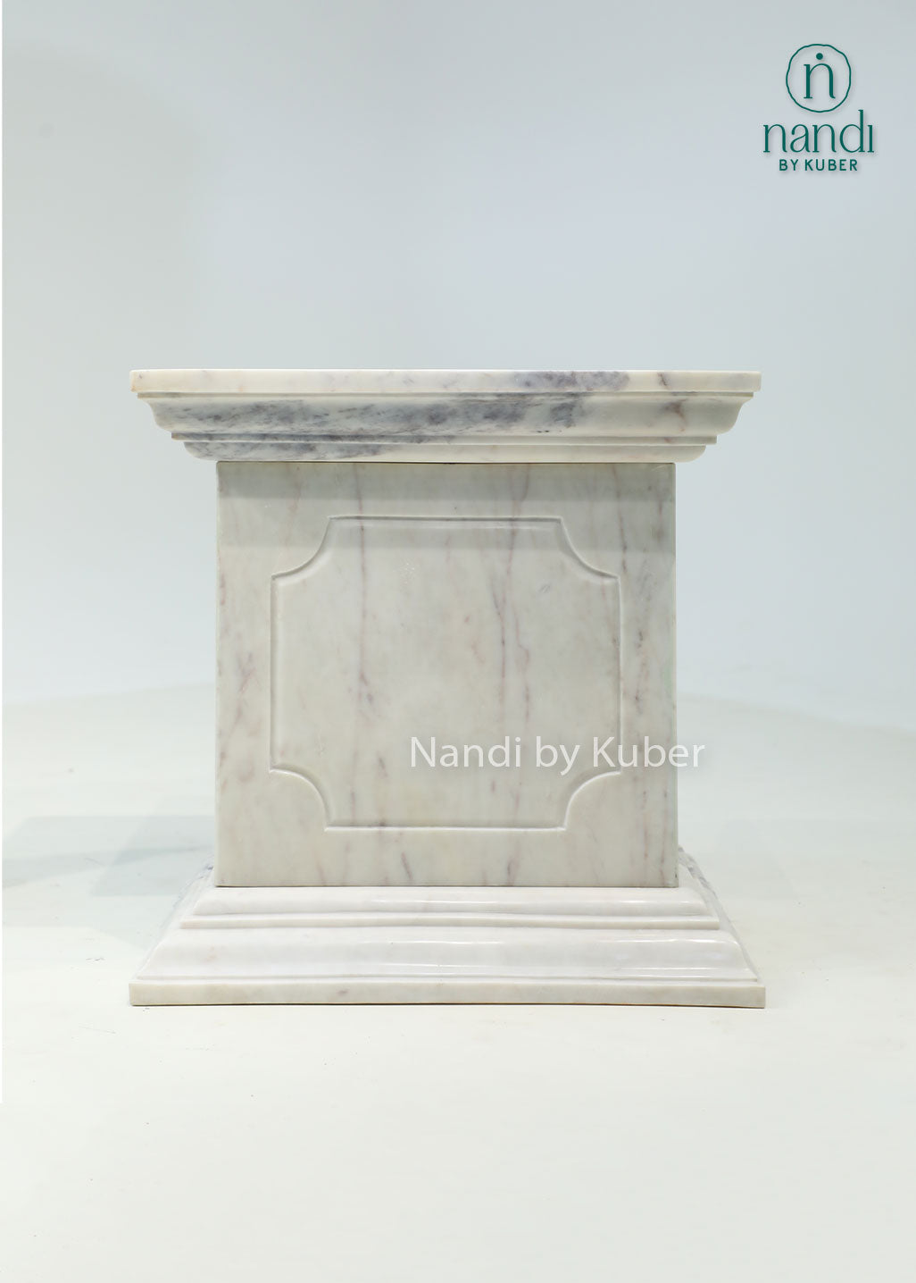 Elegant marble pedestal with timeless detailing, perfect for displaying sculptures, plants, vases, and decorative art pieces.