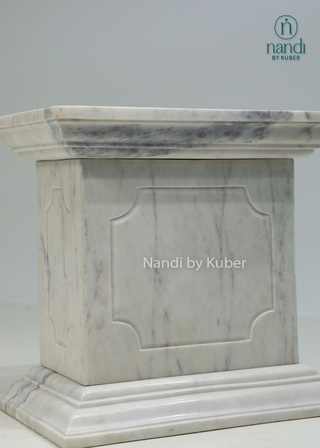 Elegant marble pedestal with timeless detailing, perfect for displaying sculptures, plants, vases, and decorative art pieces.