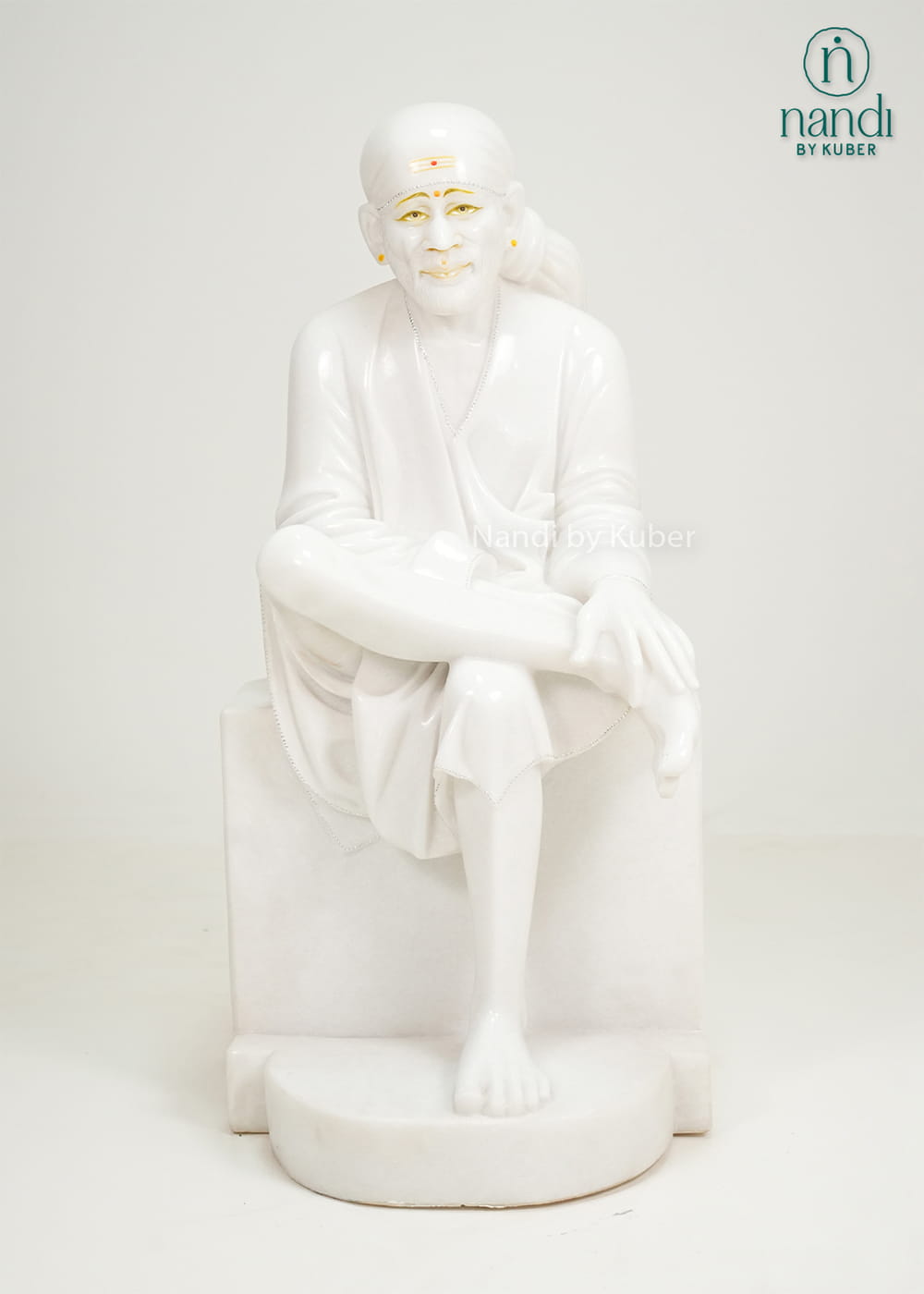 White marble Sai Baba statue